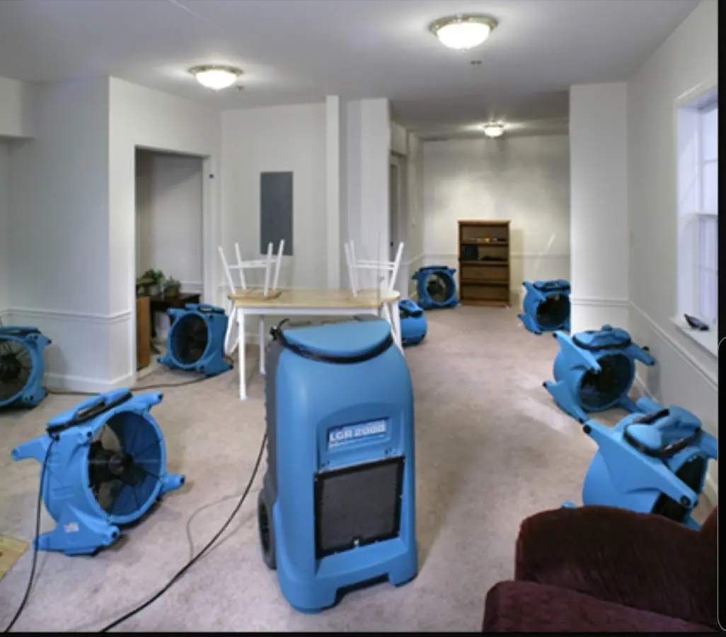Air movers and dehumidifier setup for Water Damage Restoration in Eloy